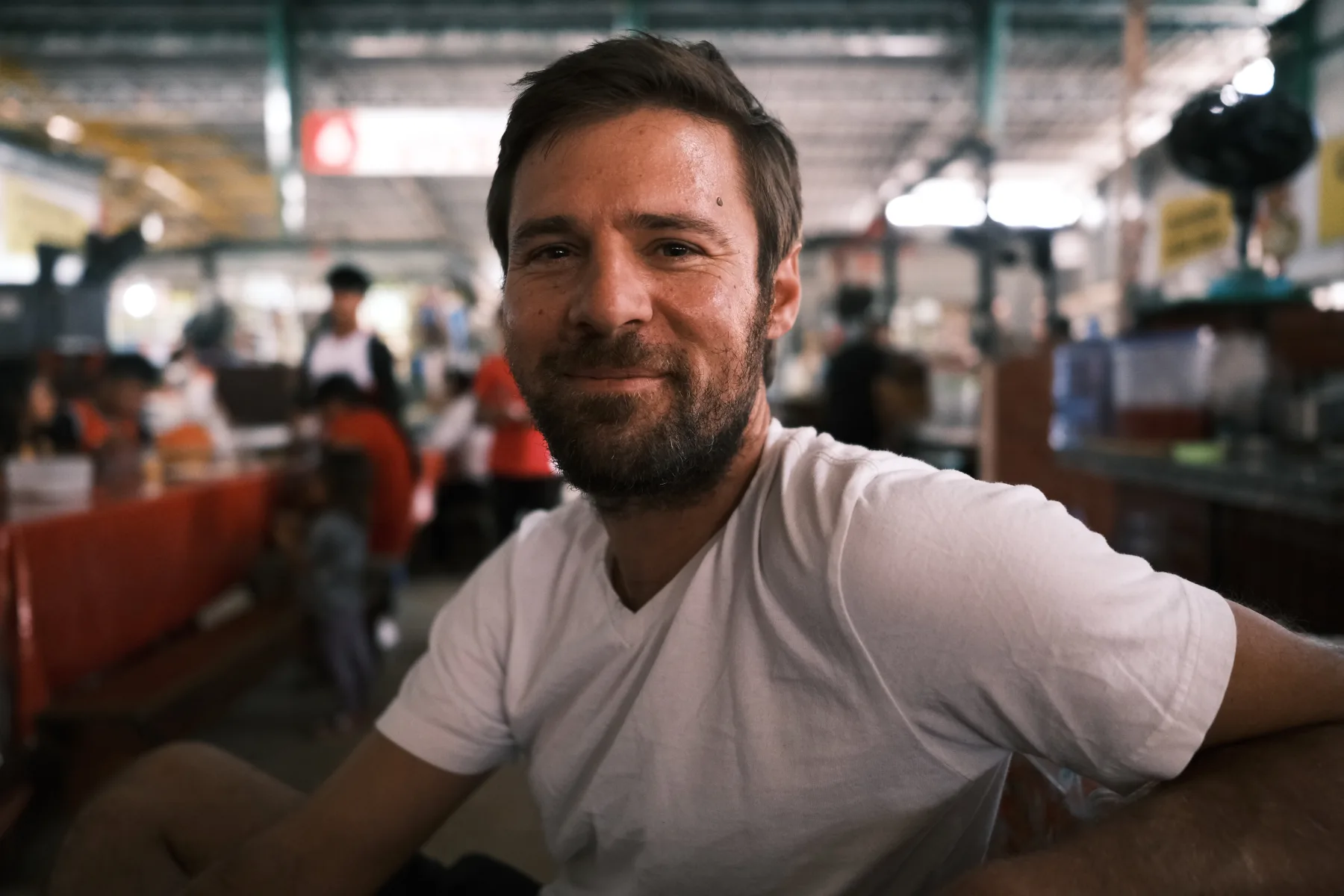 Iso Rabins standing in a food market